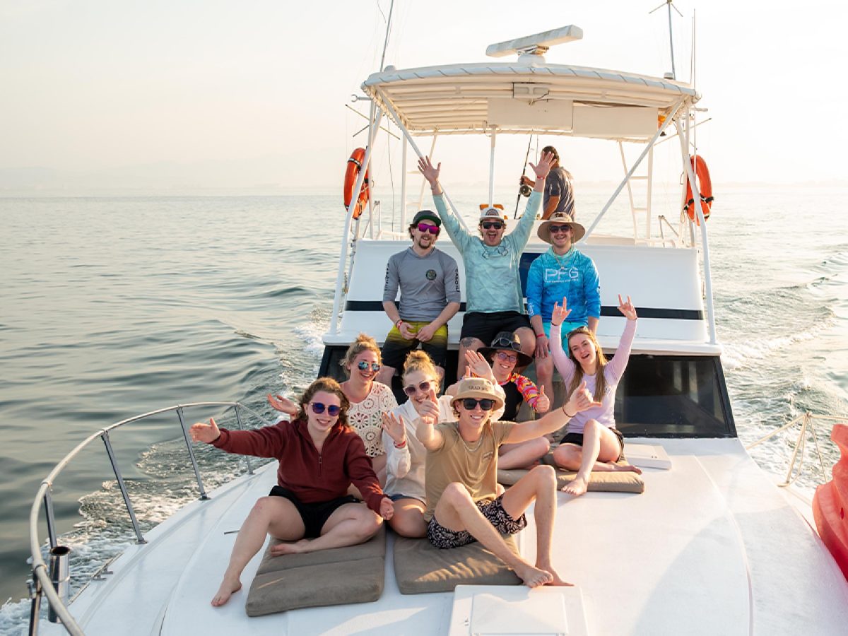 Group of friends relaxing on a sportfishing charter in Puerto Vallarta.