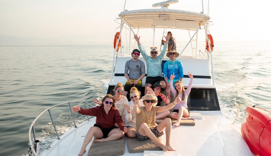 Group of friends relaxing on a sportfishing charter in Puerto Vallarta.