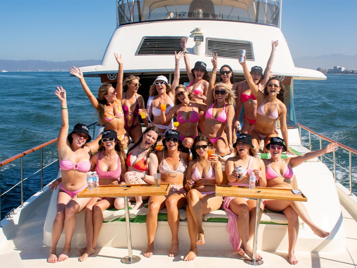 Bridesmaids in matching swimwear celebrating a bachelorette party Puerto Vallarta on a yacht.