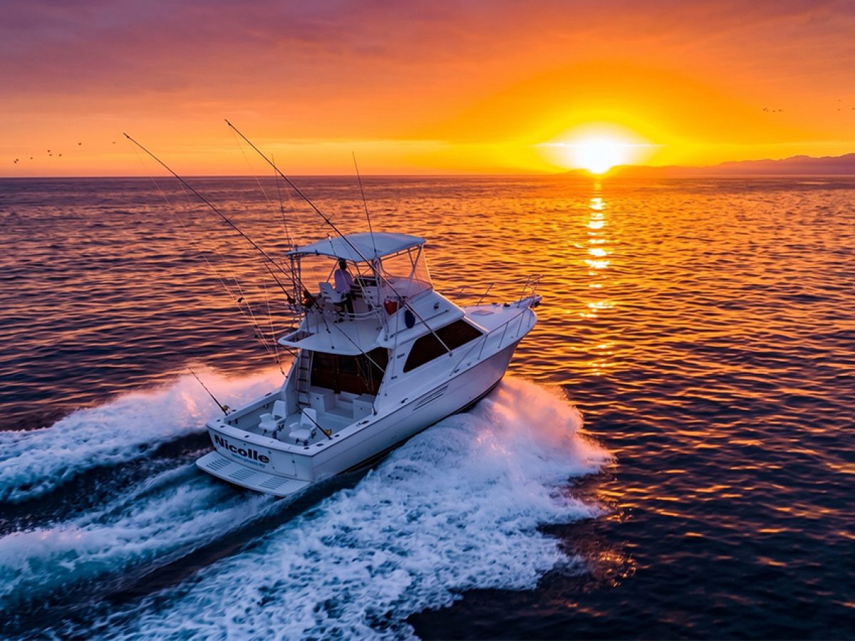 Sportfisher Nicole speeding toward deep ocean waters during sunrise in Puerto Vallarta.